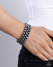 Load image into Gallery viewer, Coiled Catwalk - Silver Paparazzi Accessories
