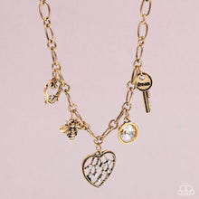 Load image into Gallery viewer, Reminiscent Reveal - Gold Paparazzi Accessories
