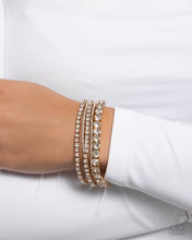 Load image into Gallery viewer, Persistent Pizzazz - Gold Paparazzi Accessories
